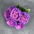 Artificial bouquet of 7 realistic purple silk roses with vibrant green leaves - Fuschia