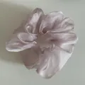 Macro detail of lavender organza scrunchie featuring elegant pearlescent mesh texture - Lotus Purple