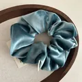 Morandi blue-green velvet scrunchie with premium texture and artistic brand label - Blue