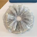 Light grey-blue oversized chiffon scrunchie with layered ruffle design on white background - Azure Blue
