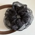 Coletero elegante de organza negra con lunares blancos para peinado de mujer - Negro