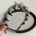 Serre-tête en mousseline fleurie violet clair avec dents antidérapantes et étiquette - Violet