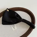 Elegant black satin bow banana clip with vintage gold metallic buckle hair accessory - Black Solid