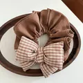 Brown oversized checkered bow scrunchie for women made of premium plaid textured fabric - Brown Plaid Style (A08-5-4421) / Brown