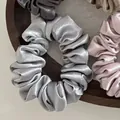 Elegant satin pleated scrunchies in silver, pink, and grey with a metallic sheen - Silver Gray