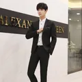 Detail of a slim-fit black business suit with a white shirt and matching trousers - M / Top And Bottom / Black