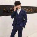 Detail of slim fit dark blue business suit with lapel, vest, and button accents - M / Set / Lake Blue
