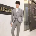 Detailed close-up of light grey slim fit three-piece suit jacket and vest set for men - M / Top And Bottom / Gray
