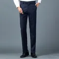 Σκούρο μπλε ανδρικό παντελόνι κοστουμιού slim fit με τσάκιση και κλασικές πλαϊνές τσέπες - S / Bottoms / Ναυτικό μπλε
