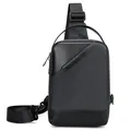 Men's dark grey nylon sling bag with black leather accent and adjustable strap - Gray