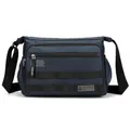 Bolso bandolera azul marino para hombre en nylon impermeable con bolsillos de cremallera - Azul oscuro