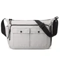 Minimalist beige messenger bag with adjustable strap and multiple utility pockets - Off White