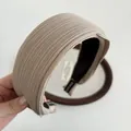 Premium beige pleated wide headband with subtle textured pattern and non-slip lining - Khaki