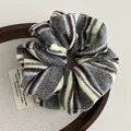 Knitted stripe scrunchie in dark grey, beige, and burgundy colors for hair styling - Gray Striped