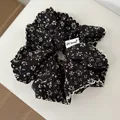 Vintage-Haargummi aus schwarzem Stoff mit beiger Spitze und feinen floralen Mustern - Spitzenbesatz-Stil / Schwarz-Aprikose
