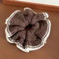 Chunky knit hair scrunchie in deep brown with white contrast trim and pleated texture - Brown