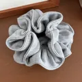 Neutral grey waffle knit scrunchie with soft fabric texture and elegant pleats - Waffle Texture / Light Gray