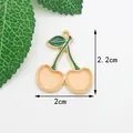 Pendentif cerise DIY avec bordure dorée et émail orange pour création de bijoux - Petite cerise rose coréenne