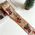 Close-up of faux linen Christmas ribbon with vintage truck, bells and red stitched edges - Burlap Bell Elk Style (R-C111)
