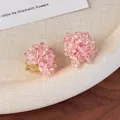 Macro detail of handmade pink beaded hydrangea clip-on earrings with faceted crystals - Pink Ear Clip Style (26801F)