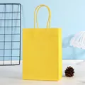 Sac cadeau minimaliste en papier kraft jaune avec poignée en corde torsadée assortie - Jaune ; Format Mini A Vertical - 12 X 6 X 16 Cm De Hauteur