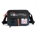 Sac bandoulière en nylon imperméable bleu et noir avec accents orange pour sport et voyage - Bleu foncé