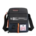 Men's crossbody messenger bag in navy blue and black with vibrant orange zipper pulls - Dark Blue
