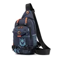 Deep blue nylon men's crossbody chest bag with contrasting orange zipper pulls - Dark Blue