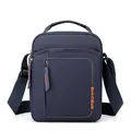 Bandolera de nailon azul oscuro para hombre con logotipo WEPOWER naranja y correa ajustable - Azul marino