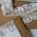 Detailed close-up of 4cm wide white floral embroidery lace trim with wavy edges - Wave Edge Small Floral Style (6#) / Width About 4cm Length 1 Meter