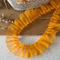 Macro shot of vibrant orange pleated organza ruffle lace trim for garment DIY decor - Full Ruffle Mesh (Style No. 5)