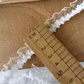 5m white pleated elastic lace trim with ruffled edge and scale ruler on wood background - Single Sided Ruffled Style / White