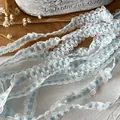 5m Light blue and white checkered elastic lace ribbon with delicate hollowed edges - White with Blue