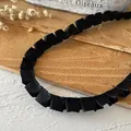 Pleated black satin ribbon trim for doll clothes and DIY sewing craft decoration - Black