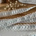 Weißes Spitzenband mit hellblauem Satinband für DIY-Handwerk und Nähprojekte - Hellblau
