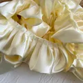 Pale yellow satin double-layer ruffled scrunchie with a silky texture and glossy finish - Wide Ruffle Style 14 (A-14)