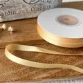 Delicato nastro di raso giallo crema in rotolo per confezioni regalo e fai da te - Giallo chiaro