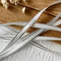 White polyester ribbon with silver glitter edges for DIY crafts and gift wrapping - Width 0.6cm Length 5m / Off-White Silver Edge