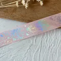 Pale pink DIY ribbon with laser butterfly and floral motifs on a rustic wooden background - Peach Pink