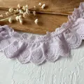 Close-up of light purple pleated cotton lace trim with embroidered heart patterns - Light Purple