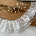 White pleated lace ribbon with exquisite floral embroidery for DIY sewing projects - White
