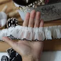 White ruffled lace trim with black wavy edge for DIY crafts and doll clothing - White