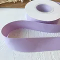 Pale purple 2.5cm matte ribbon spool for DIY crafts and gift wrapping projects - Lavender
