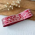 Red Halloween ribbon with white witch hats and bat prints for DIY craft projects - Red