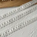 White ruffled lace trim with satin ribbon insertion for DIY sewing and doll clothes - White