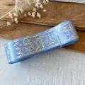 Sky blue laser ribbon with holographic star and magic wand patterns for DIY crafts - Baby Blue