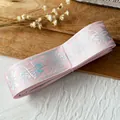 Pink satin ribbon with holographic rose patterns and stars for DIY crafts and decor - Long Style / Peach Pink