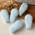 Set of five light blue faux rabbit fur oval hair clips with soft plush texture for styling - Blue Rabbit Ears