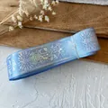 Light blue ribbon with iridescent metallic rose and star patterns for DIY crafts - Baby Blue