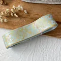 Cinta decorativa azul claro con patrón de rosas doradas para decorar bolsos - Azul Claro Patrón Oro